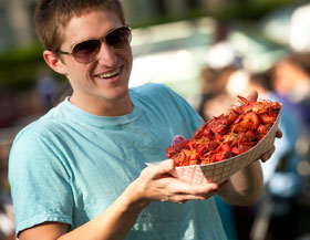 Man holding crawfish